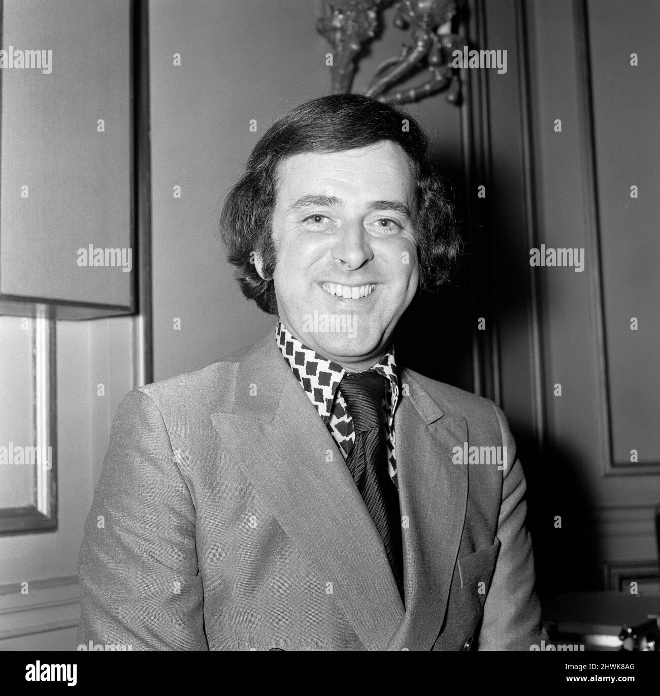 Readers of 'New Reveille' have voted Terry Wogan the top spot in the Radio 2  DJ line-up for the second successive year. The DJ was presented with his  golden microphone award at