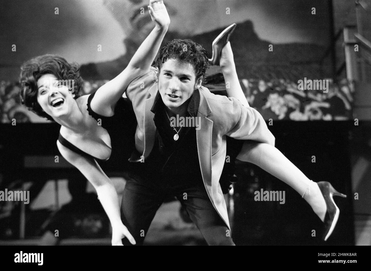 The cast of the American musical Grease rehearsing at the New London