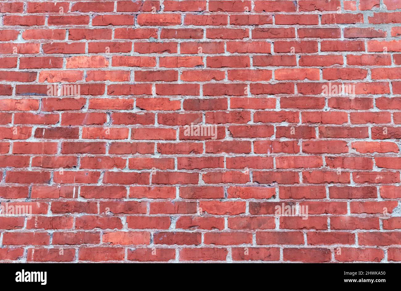Brick wall with red brick, red brick background. Red grunge brick wall