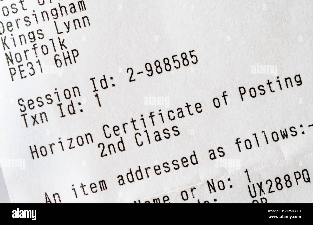 A receipt shows that a Certificate of Posting has been processed by the Post Office Horizon IT system.  NB: Personal data anonymised. Stock Photo