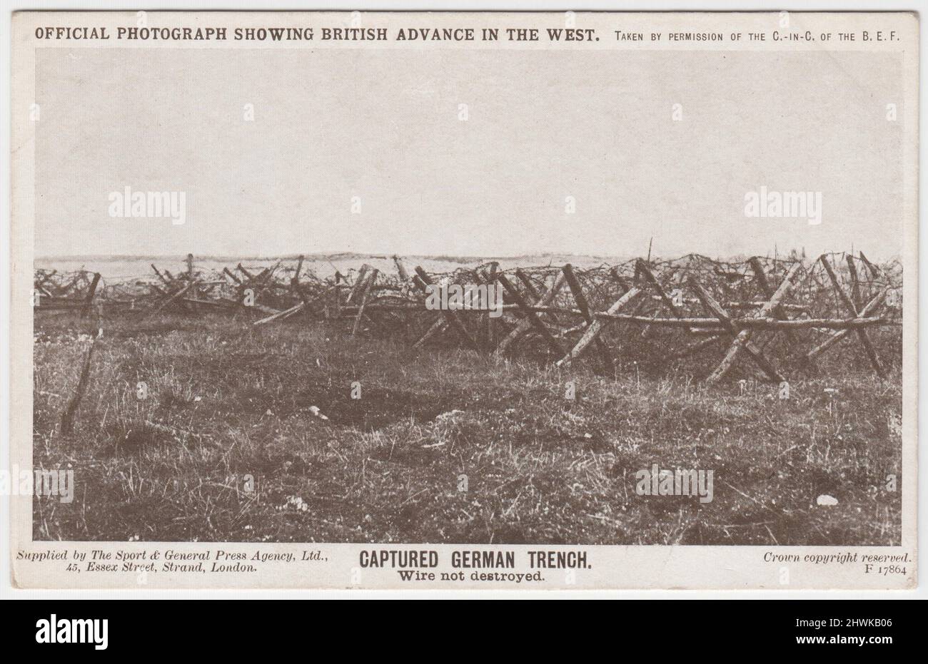 'Captured German trench. Wire not destroyed': 'Official photograph showing British advance in the West' taken by permission of the Commander in Chief of the British Expeditionary Force (BEF), supplied by The Sport & General Press Agency Ltd., 45 Essex Street, Strand, London. View of barbed wire barricades on the Western Front Stock Photo