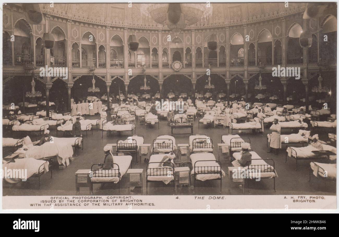 Royal Pavilion Indian Hospital, Brighton, First World War: beds laid out under the Dome. Wounded Indian soldiers are sitting and lying on the beds and some medical personnel can also be seen in the picture. The postcard was published by the Corporation of Brighton with the assistance of the Military Authorities, using a photograph by A.H. Fry of Brighton Stock Photo