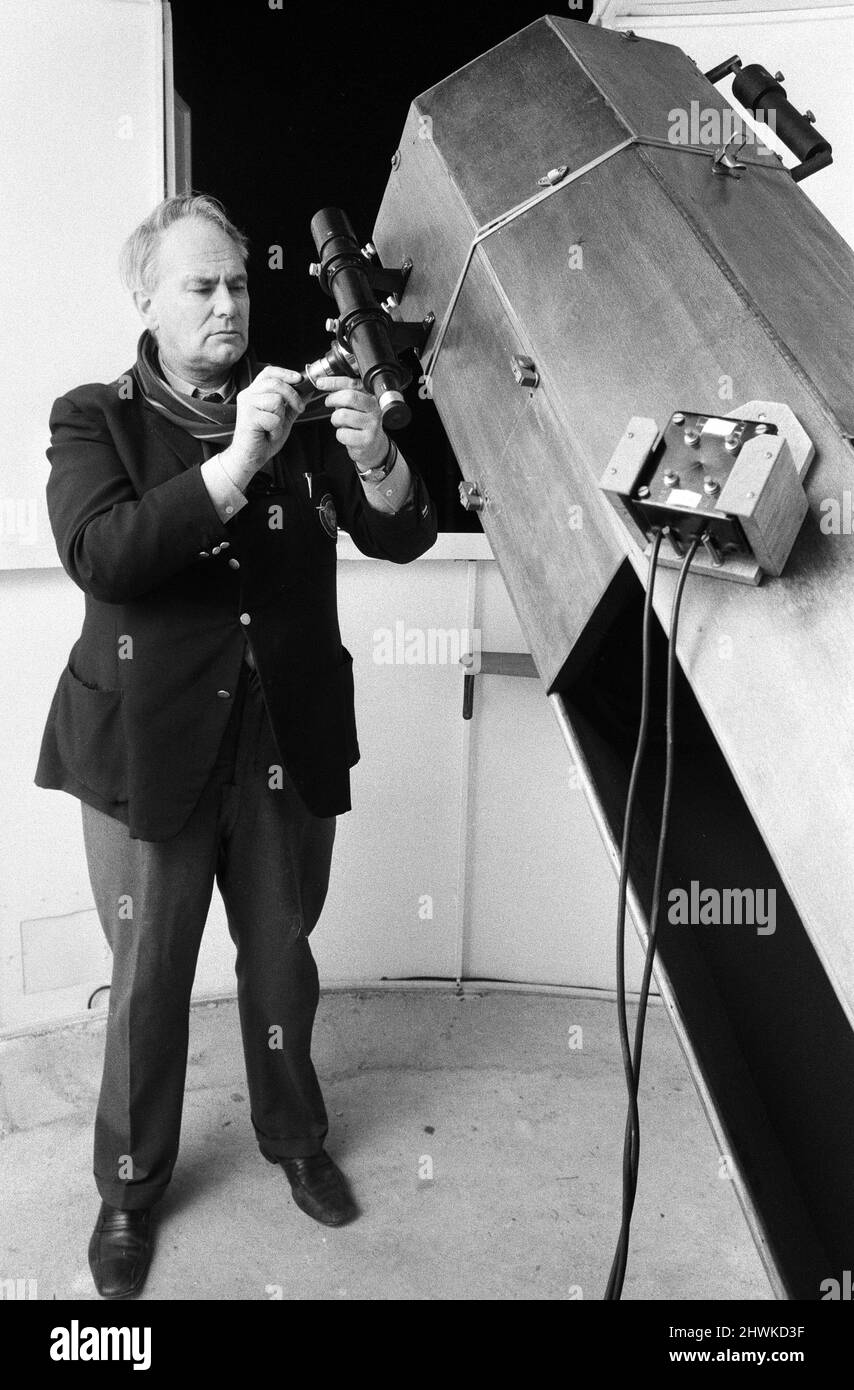 Astronomer Patrick Moore, host of the BBC factual series The Sky At Night, pictured in the Observatory in the garden of his home at Selsey, Sussex where he is attempting to photograph the Kohoutek Comet.1st December 1973. Stock Photo