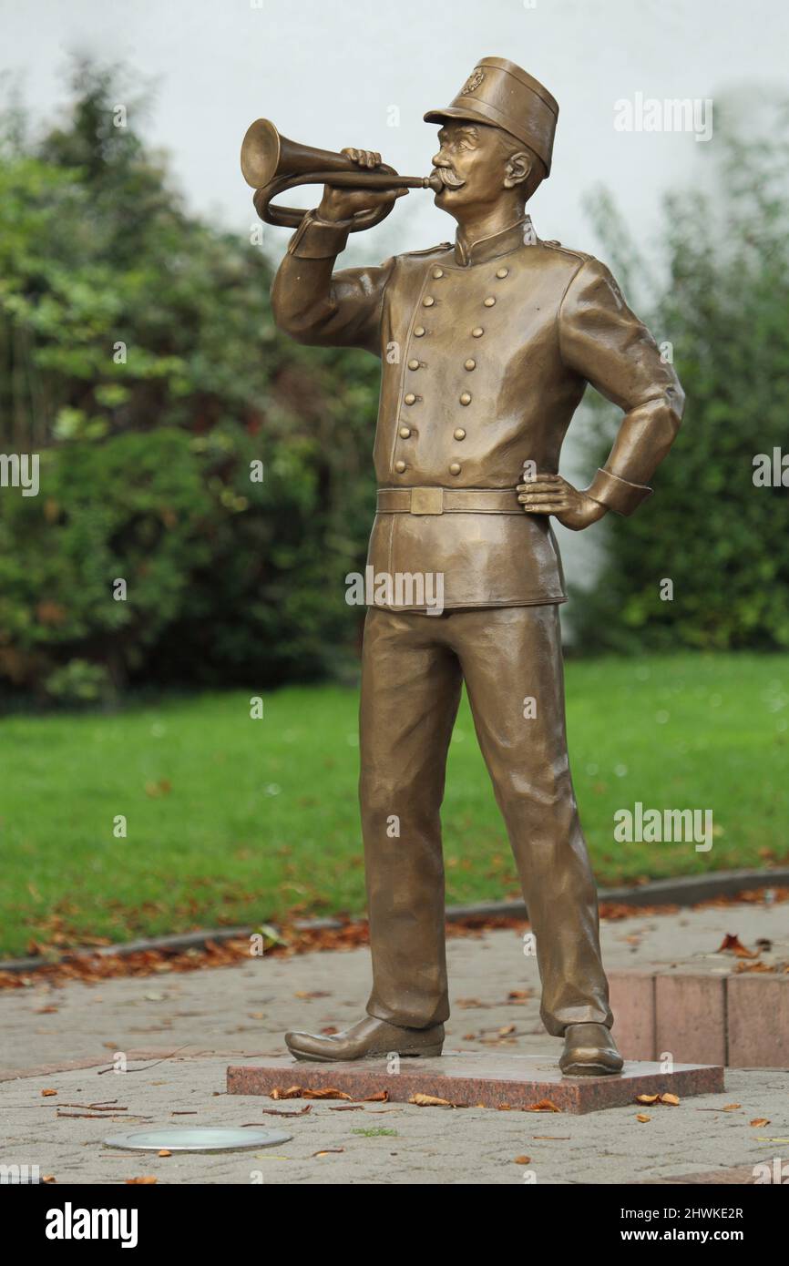 Golden historical figure, brass, in Hechtsheim Mainz, Rhineland-Palatinate, Germany Stock Photo