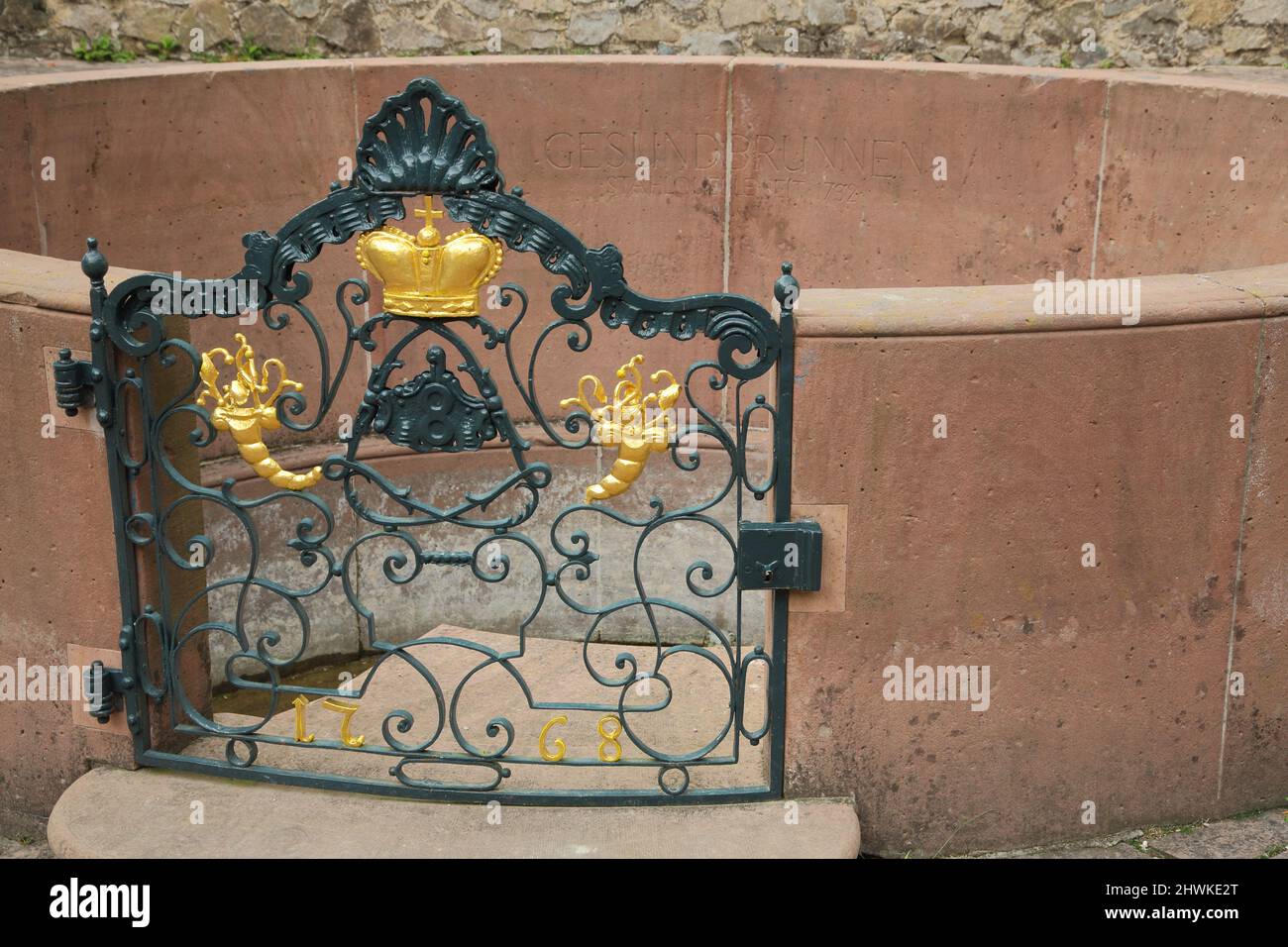 Gate with decoration, Gesundbrunnen in the Fürstenlager, Bensheim, Hesse, Germany Stock Photo