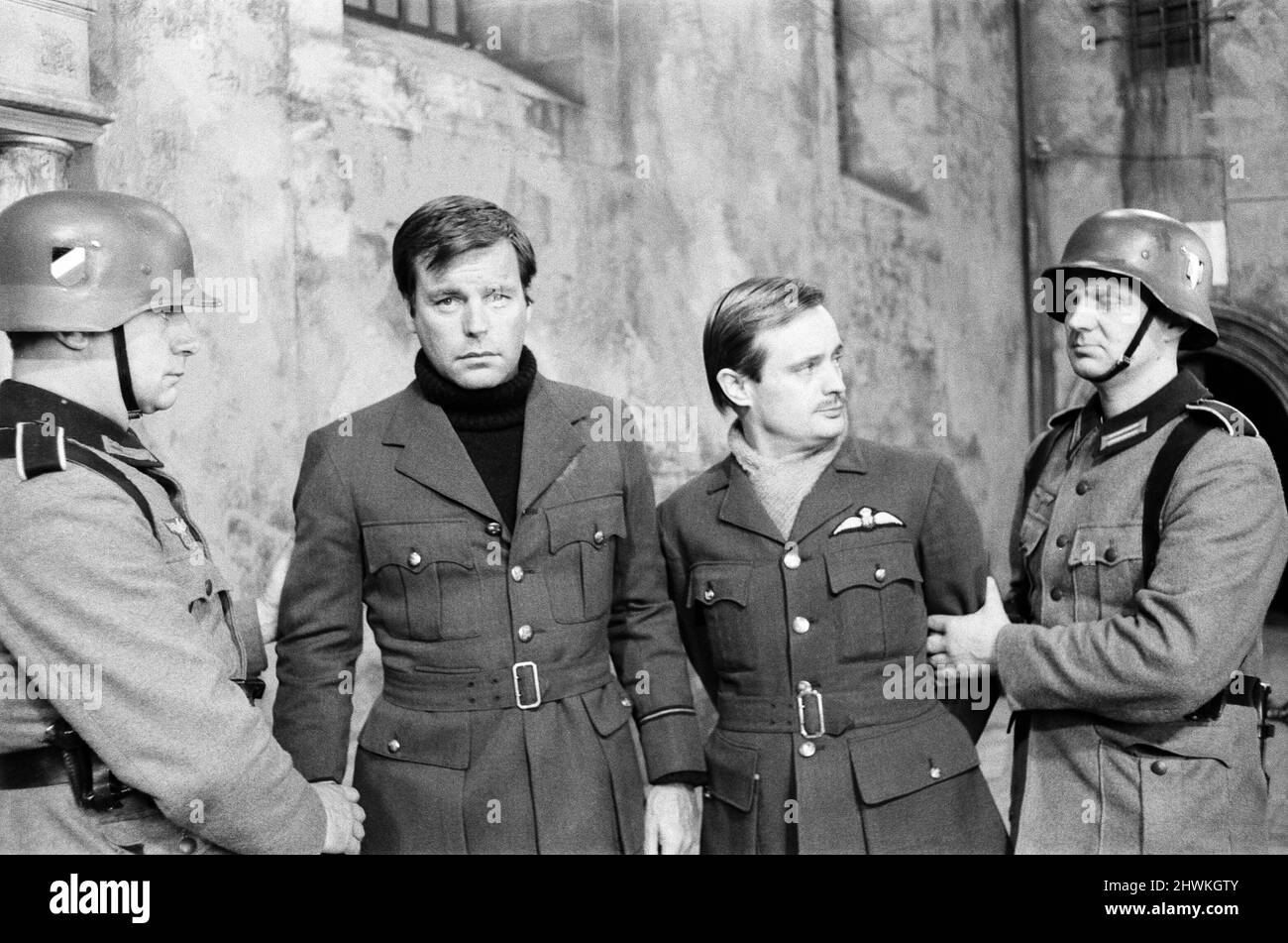Colditz, Photo-call for new BBC television series, actors pose for the cameras on first day of filming, Ealing Studios, London, 19th June 1972.  Pictured, Robert Wagner as Flight Lieutenant Phil Carrington and David McCallum as Flight Lieutenant Simon Carter. Stock Photo