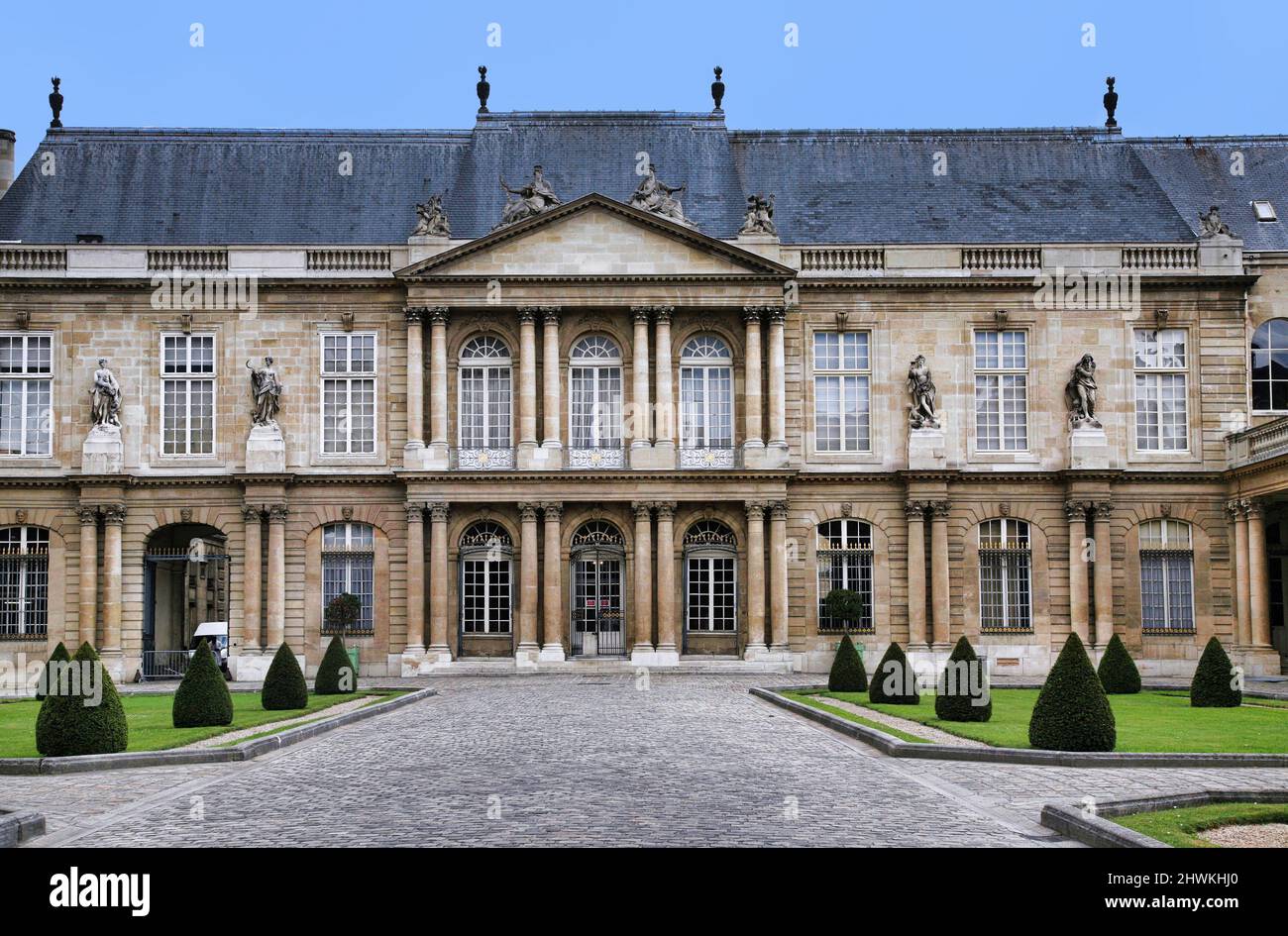 Paris, France :  The ornate baroque facade of the French National Archives museum in the Marais district, housed in the 18th century Soubise palace Stock Photo