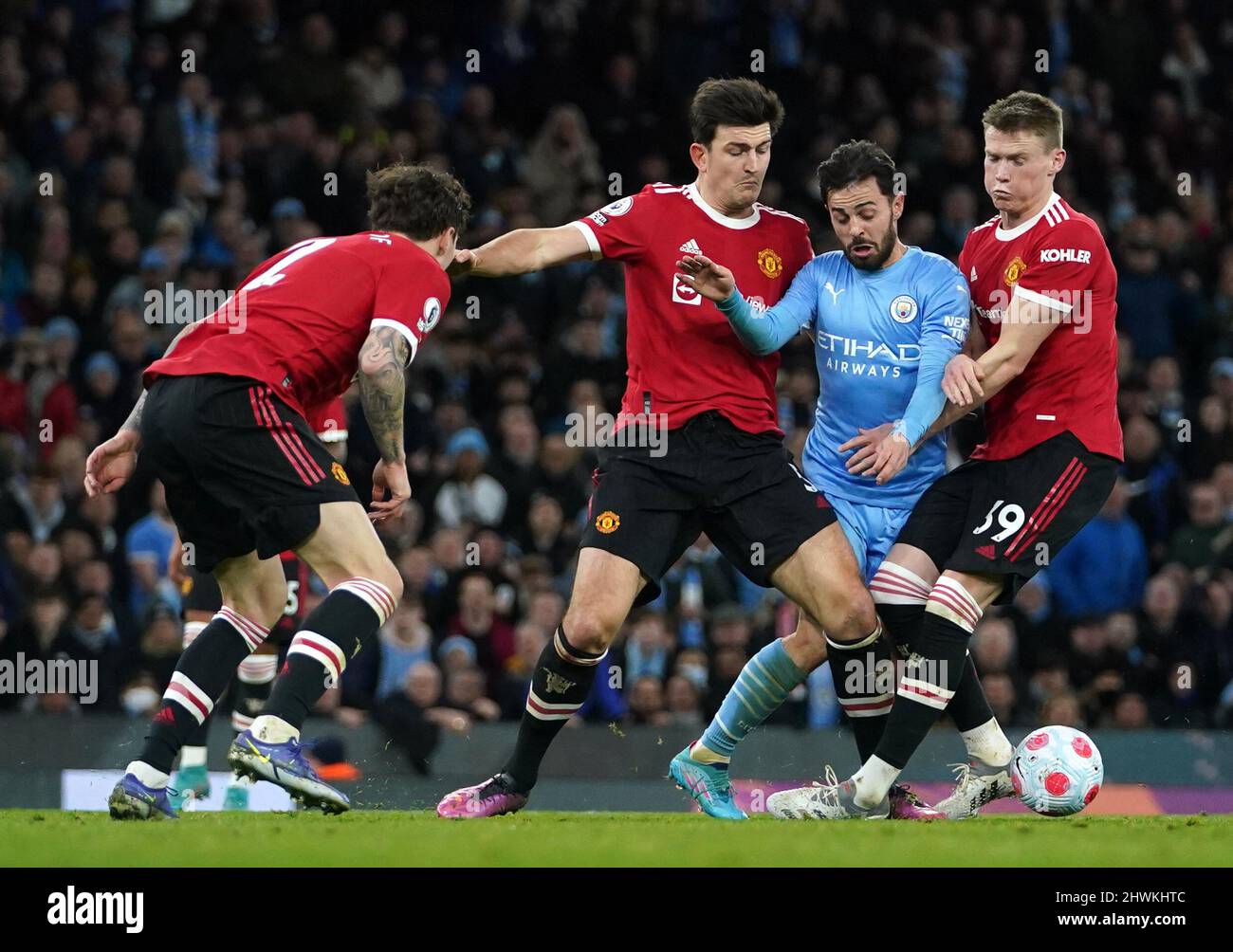 Manchester United's Victor Lindelof, Harry Maguire, Manchester City's