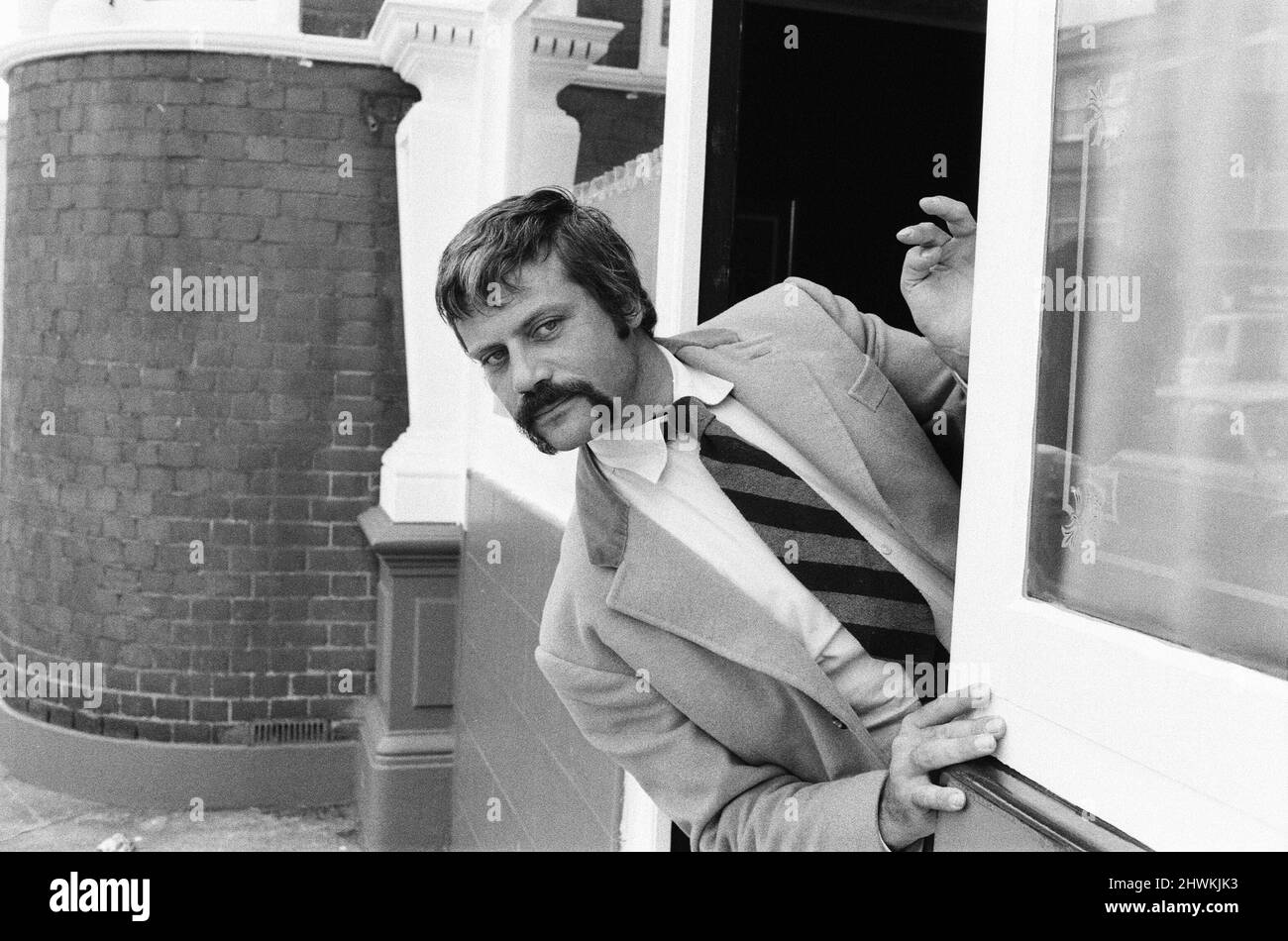 Oliver Reed, British actor, enjoys a few drinks at his local pub, The ...