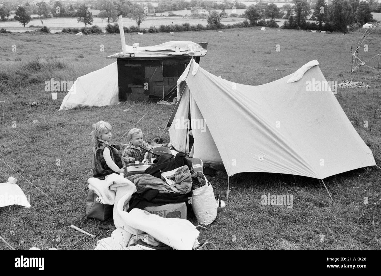 The Glastonbury Fayre of 1971, a free festival planned by Andrew Kerr and Arabella Churchill . Picture shows: Children outside their tents during the festival. 19th June 1971. Stock Photo