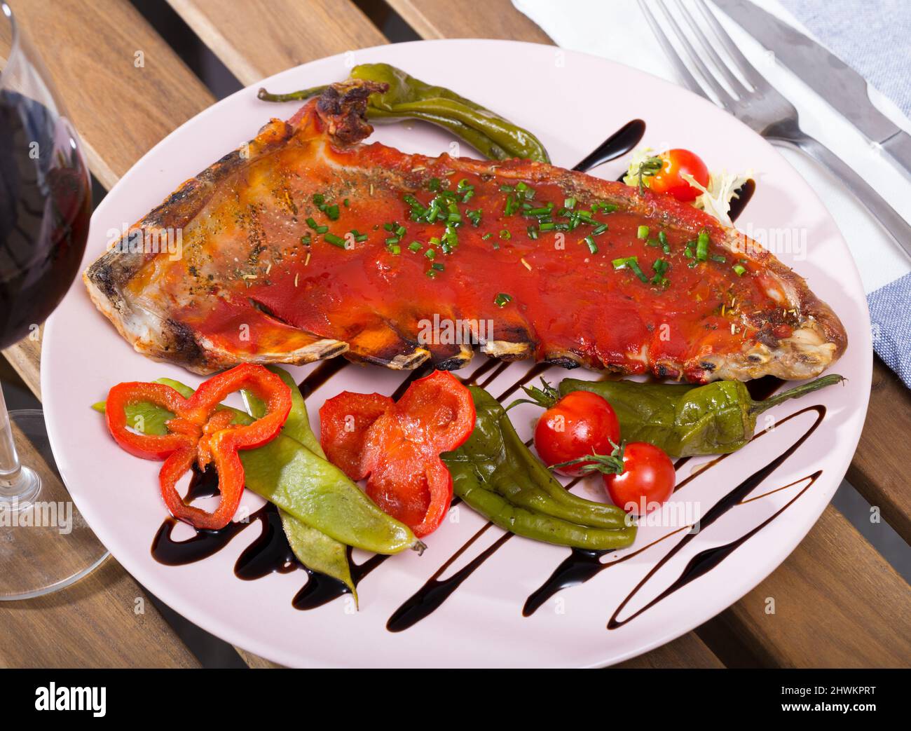 Mutton ribs baked under hot tomato sauce with red wine Stock Photo Alamy