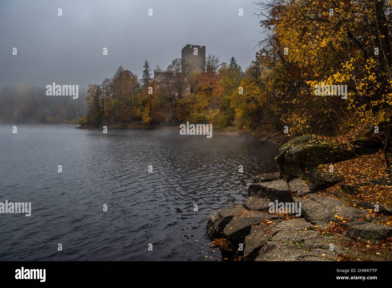 Castle Lichtenfels In Autumnal Landscape With Foggy Lake Ottenstein In Austria Stock Photo