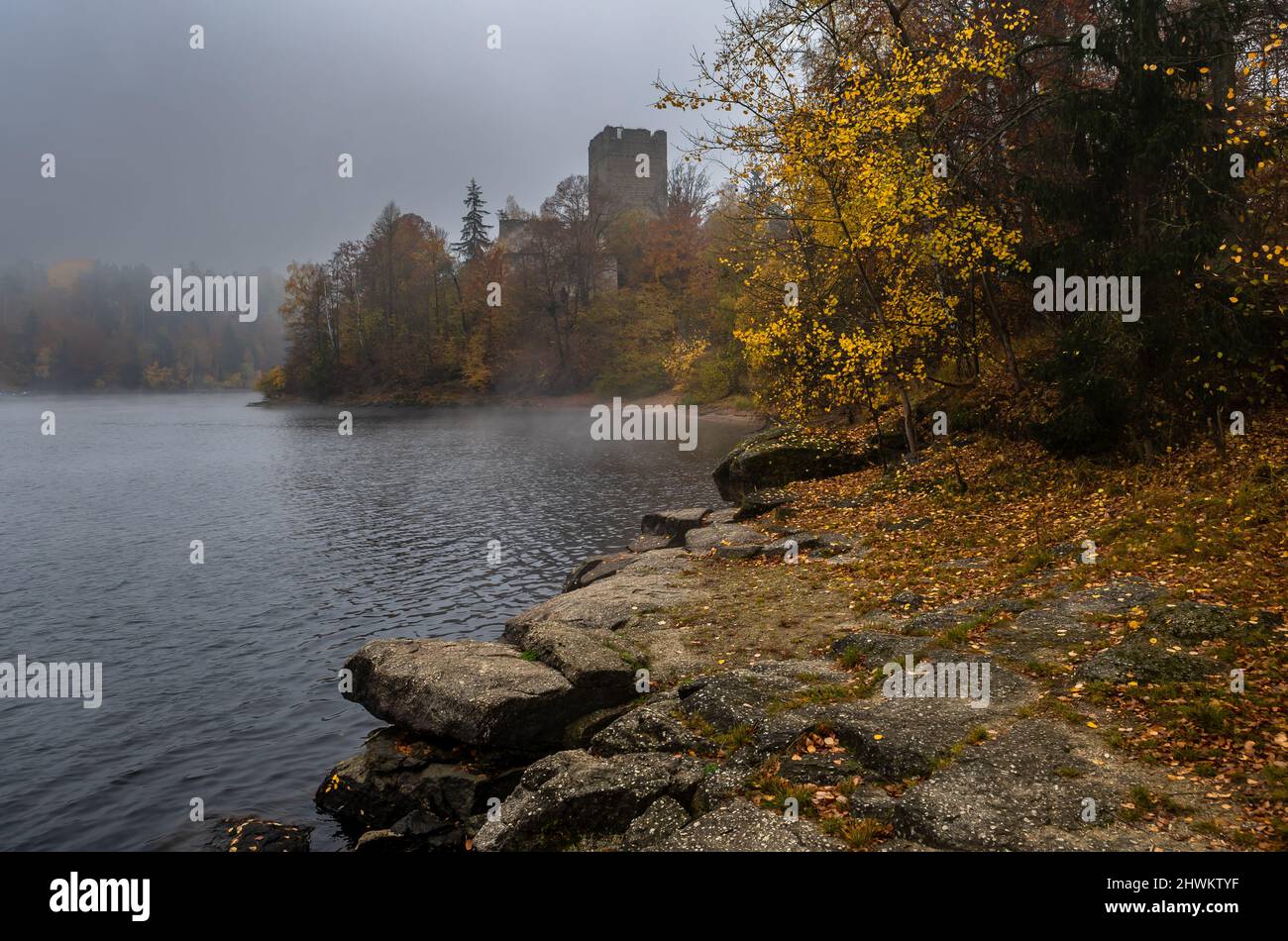 Castle Lichtenfels In Autumnal Landscape With Foggy Lake Ottenstein In Austria Stock Photo