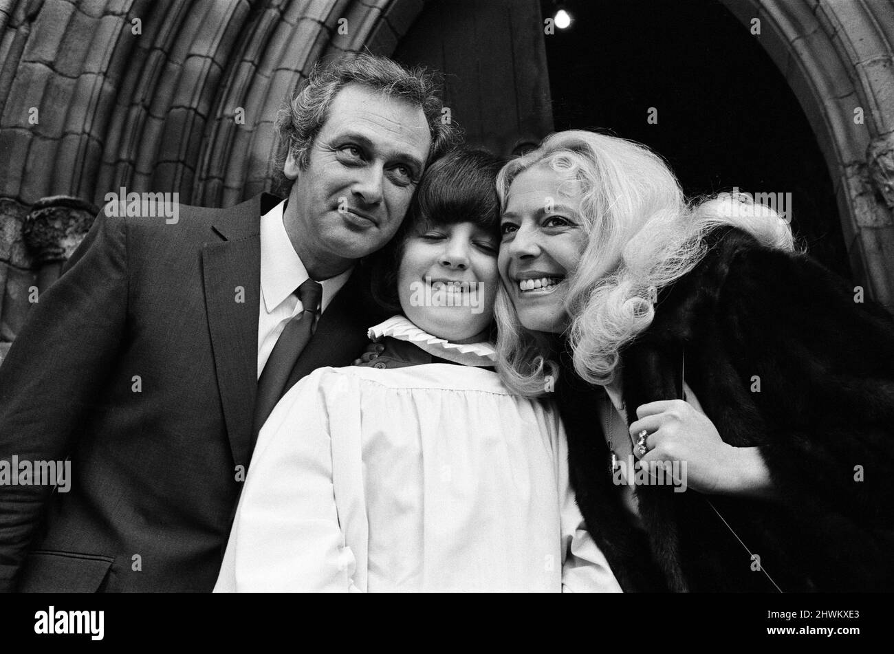 Granada TV star Julie Goodyear, 30, who plays the barmaid in the Rovers Return in 'Coronation Street' is pictured with her husband-to-be Tony Rudman, 42, and her son from a previous marriage, Gary Goodyear, 12. Gary is a choirboy at Bury Parish Church where they will wed. 18th February 1973. Stock Photo