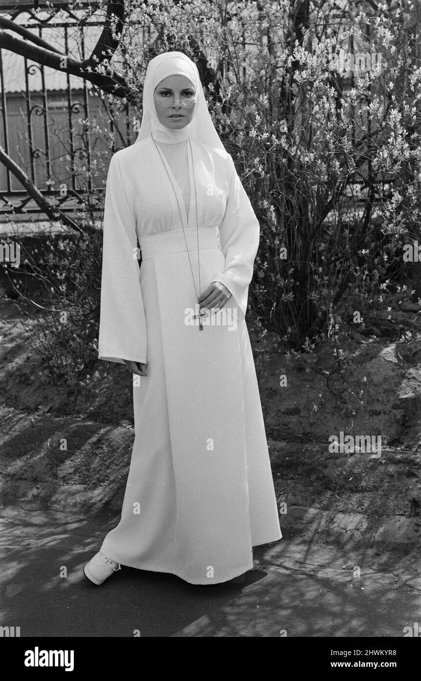Raquel Welch pictured on set, in Hungary filming her new movie 'Bluebeard'.  Ms Welch plays Sister Magdalena, a novice nun.   The film also stars Richard Burton  Bluebeard is a 1972 film directed by Edward Dmytryk. It stars Richard Burton, Raquel Welch, Joey Heatherton and Sybil Danning. Set in Austria in the 1930s, Bluebeard is a World War I pilot with a reputation as a 'ladykiller' and a frightening blue tinged beard.   Picture taken 19th March 1972 Stock Photo