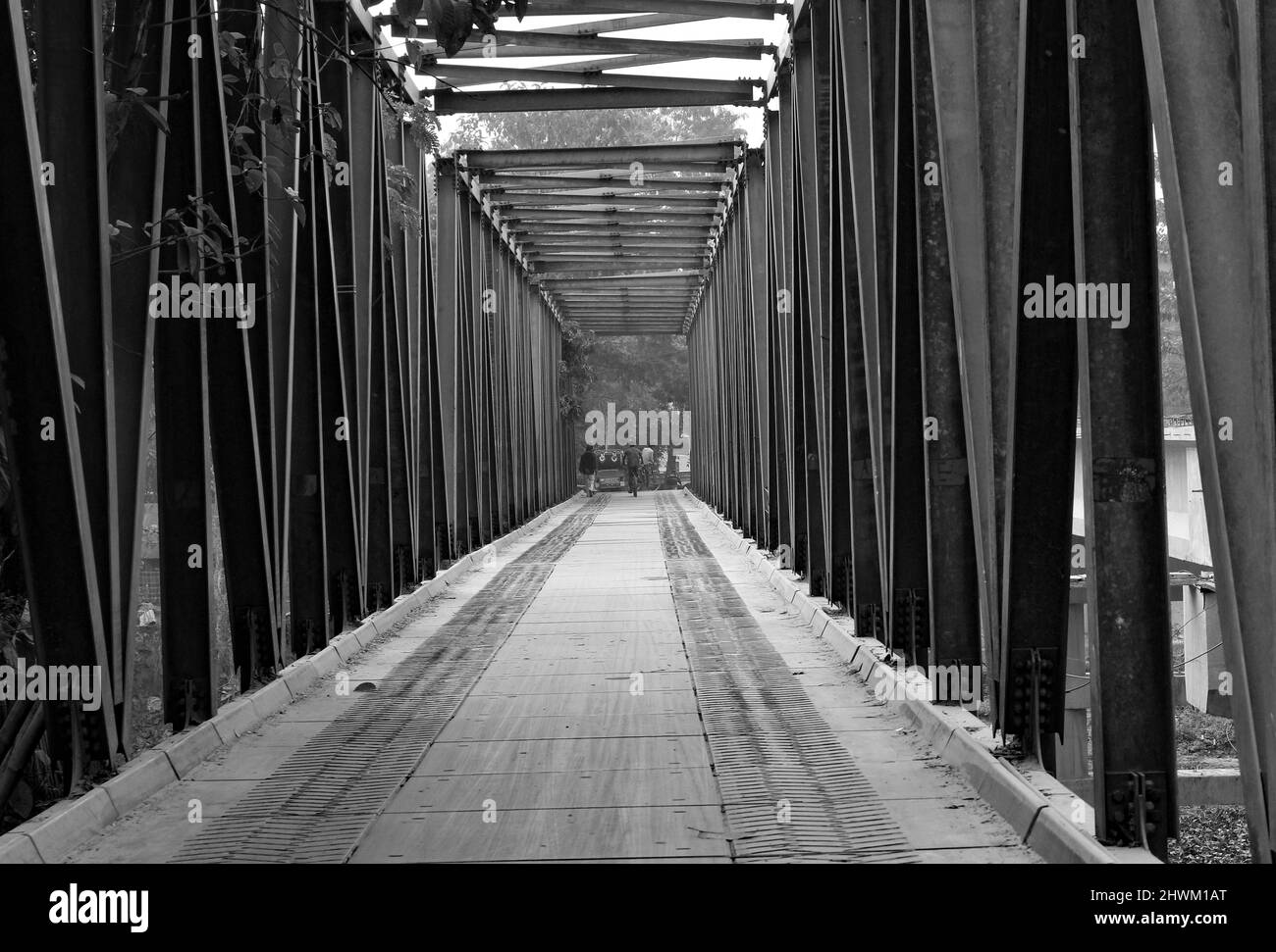 Crossing Iron Bridge in the Village Stock Photo