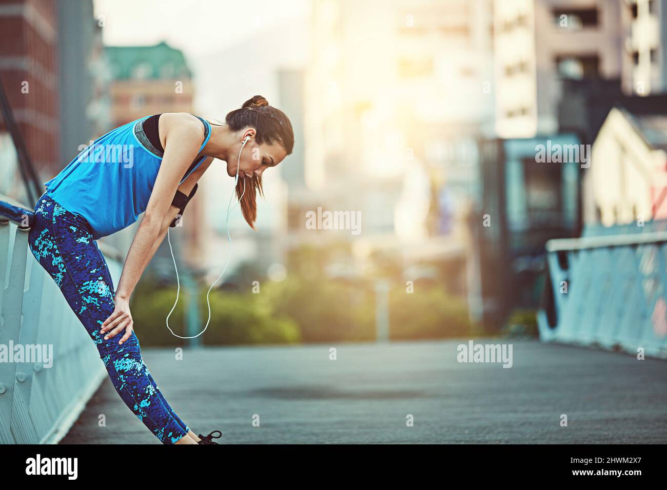 Take breaks but never quit. Shot of a young woman looking exhausted