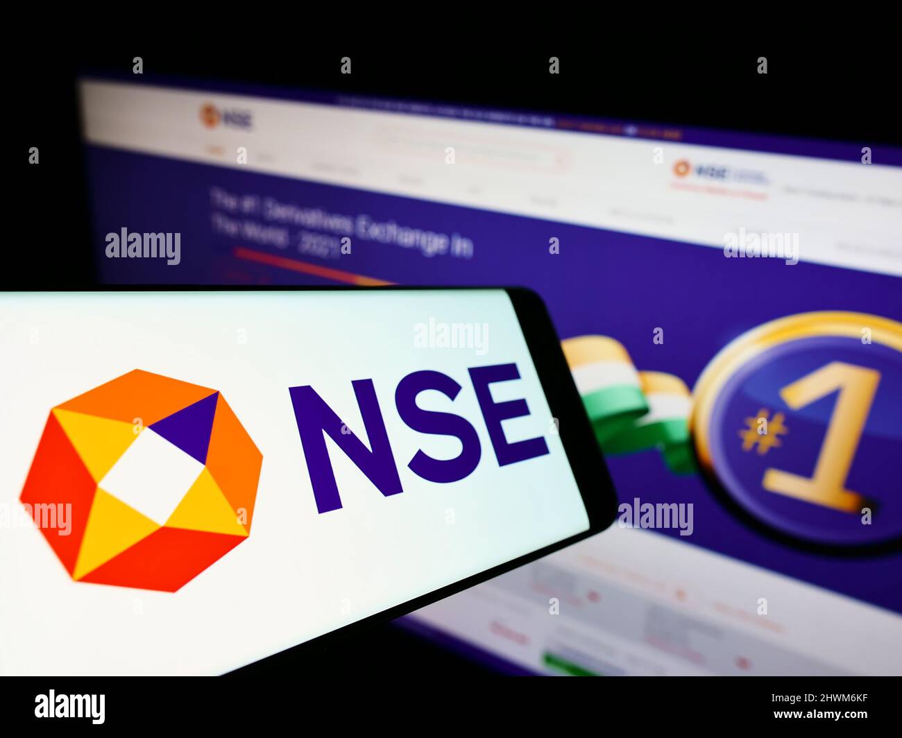 Cellphone with logo of National Stock Exchange of India Limited (NSE