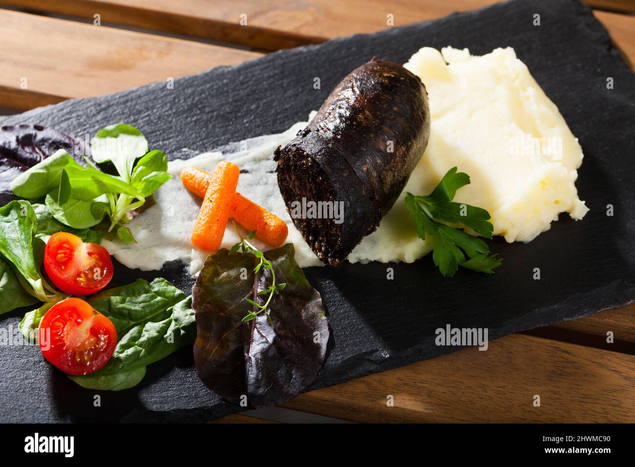Blood sausage with vegetables Stock Photo Alamy