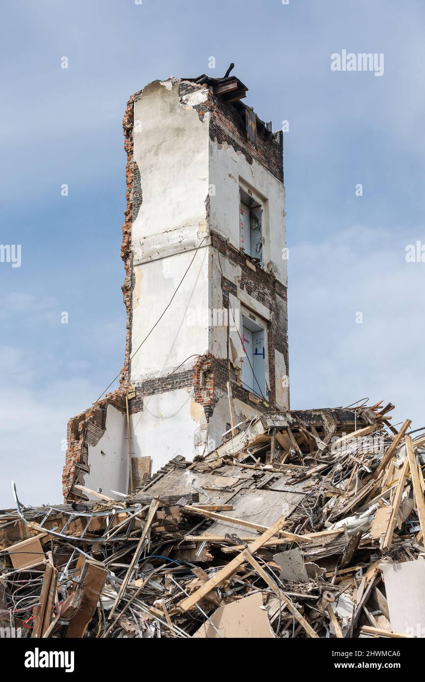 Demolition workers tear down the Tama Building in Burlington, Iowa. In