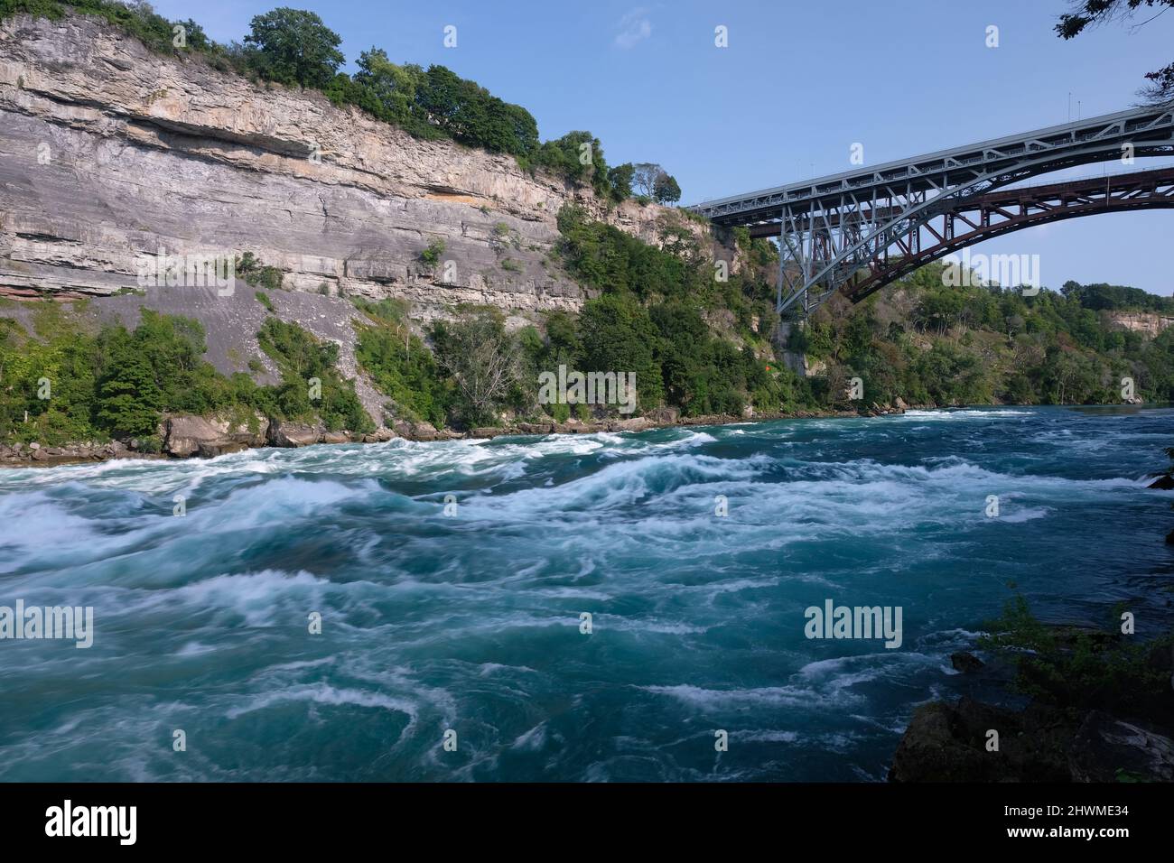 Shot of the Great Gorge and bridge from the boardwalk of the White Water Walk, Niagara Falls, Niagara, Ontario, Canada. Stock Photo
