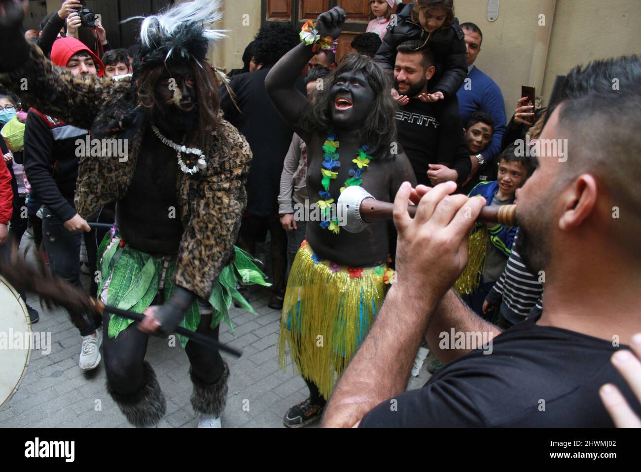 El Mina, Lebanon. 6th Mar, 2022. People take part in a celebration of