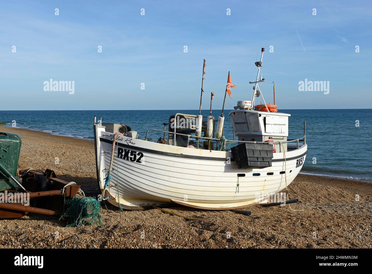 A fishing boat on the shingle beach at Hastings, East Sussex UK Stock ...