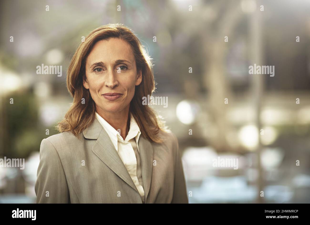 Time ti get back to business. Cropped portrait of a businesswoman standing outside. Stock Photo