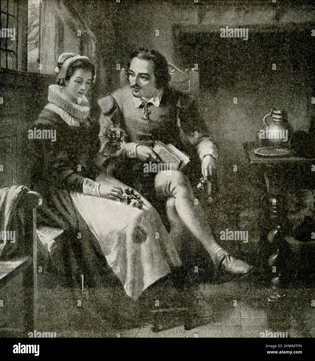 The 1912 caption for this image reads: 'Shakespeare at age 19 in Anne Hathaway's Cottage at Stratford - Cottage of Anne Hathaway.' The 1912 caption for this illustration reads: William Shakespeare (died 1616) was an English playwright, poet and actor, widely regarded as the greatest writer in the English language and the world's greatest dramatist. He is often called England's national poet and the 'Bard of Avon'. Anne Hathaway (died 1623) was Shakespeare’s wife. They were married in 1582, when Hathaway was 26 years old and Shakespeare was 18. Stock Photo
