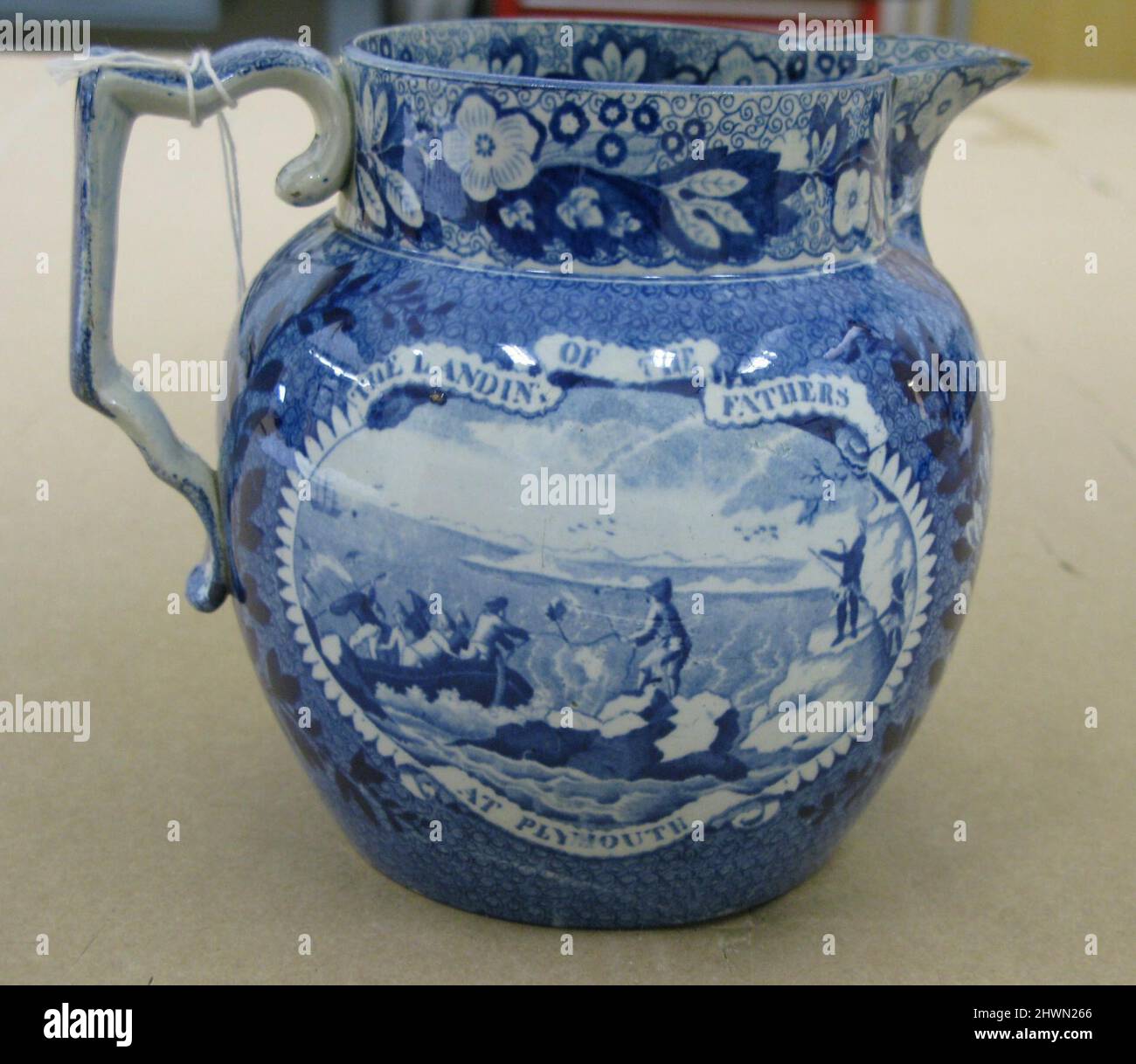 Pitcher with a view of “The Landing of the Fathers at Plymouth”. Manufacturer: Enoch Wood and Sons, British, 1820–1846After Probable source material a) painting by: Michele Felice Cornè, American, born Italy, 1752–1845After Probable source material b) engraved after: John Warner Barber, American, 1798–1885Engraver Probable source material c) engraved by: Samuel Hill, American, active 1789–1803Honorand: John Carver, American, ca. 1576–1621Honorand: William Bradford, American, 1590–1657Honorand: Edward Winslow, American, 1595–1655Honorand: William Brewster, American, 1567–1644Honorand: Myles Sta Stock Photo