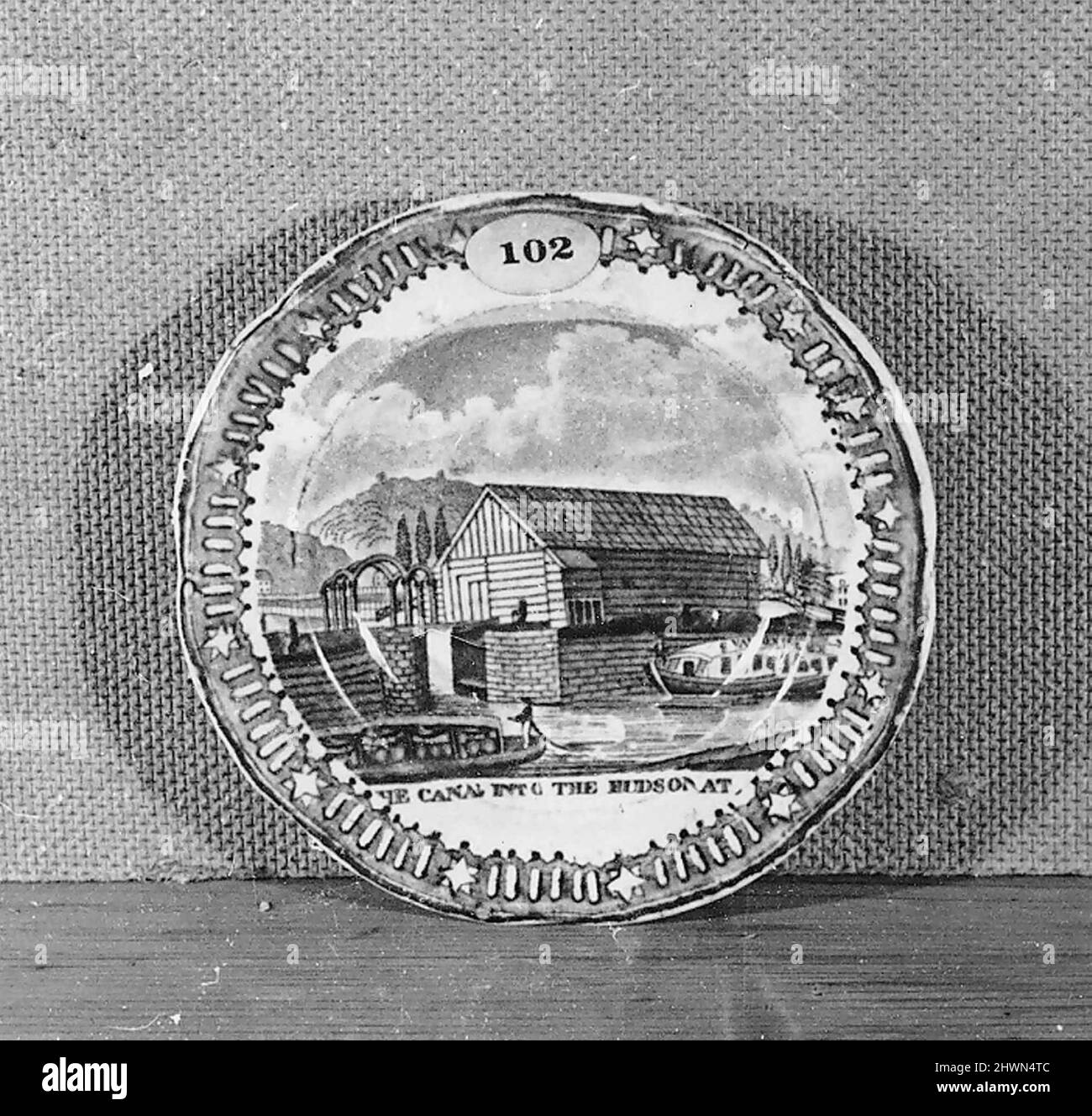 Cup Plate with a View of “The Canal into the Hudson at Albany”. Engraver Source material by: Rawdon, Clark and Company, American, 1823–1828After drawing by: James Eights, American, 1798–1882 Stock Photo