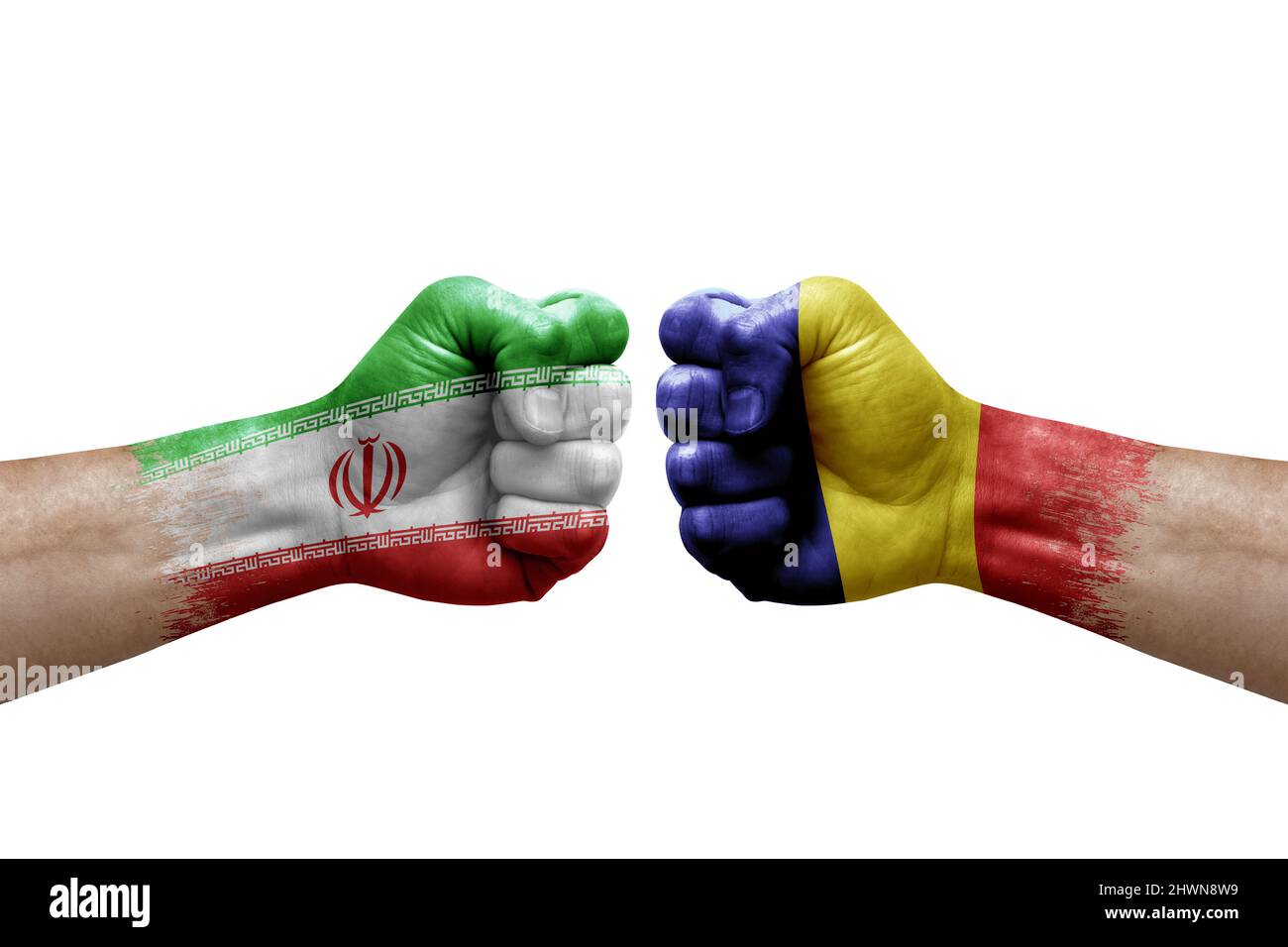 Two hands punch to each others on white background. Country flags painted fists, conflict crisis concept between iran and romania Stock Photo