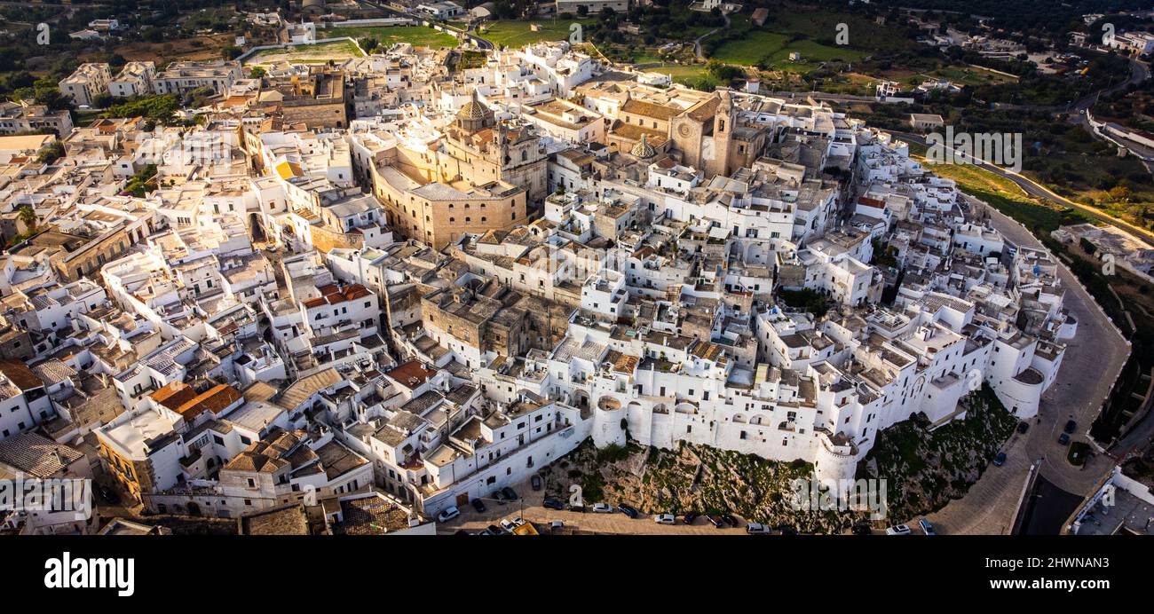 The famous white houses of Ostuni in Italy - aerial view Stock Photo