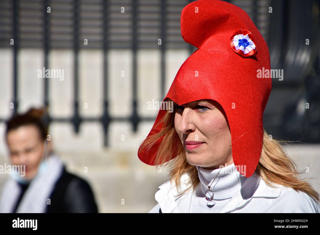 Marseille, France. 26th Feb, 2022. A woman dressed as a ''Marianne'' with a  Phrygian cap takes part during the demonstration.Women dressed as the  ''Marianne'' (symbol of freedom in France) demonstrate in Marseille