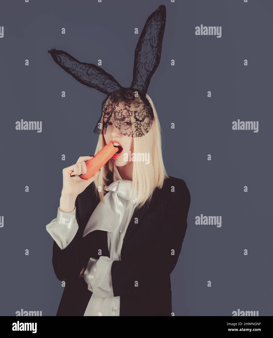 Cute bunny woman. Happy young woman wearing bunny ears and having