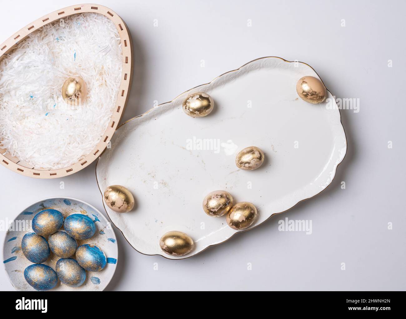 Happy easter time. Bright Easter holiday concept with spring flowers and easter eggs. Colorful Easter eggs background Stock Photo