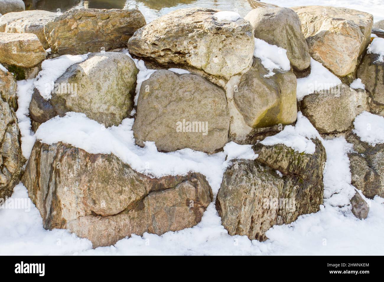 Stone covered with Snow Stock Photo