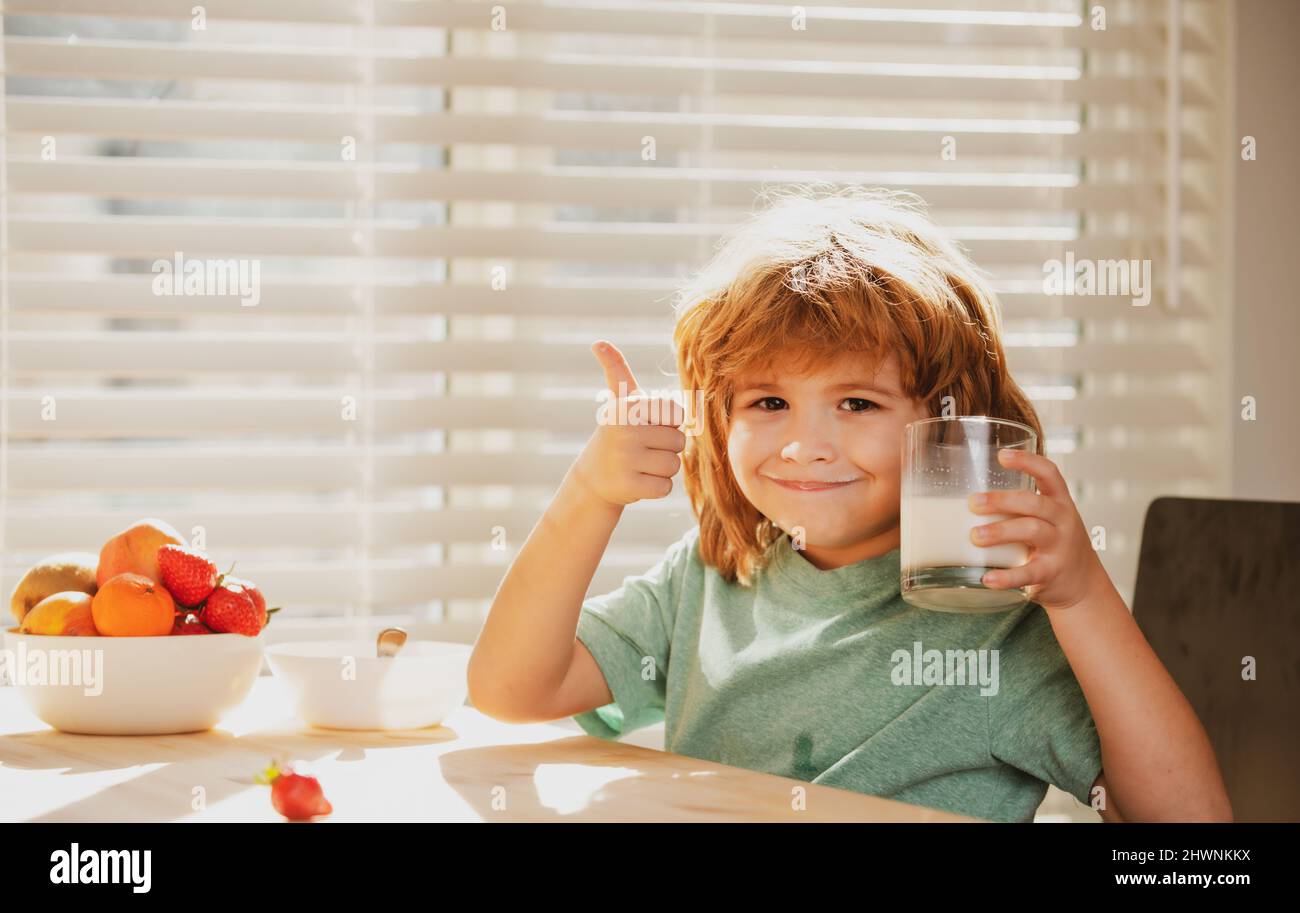 Kid eating breakfast. Child eating healthy food. Stock Photo