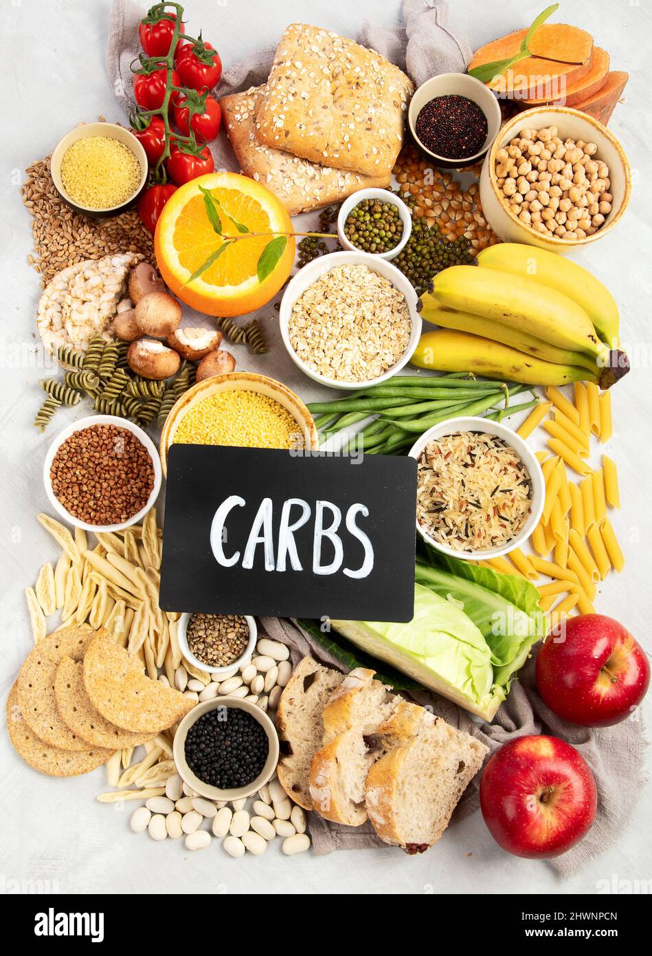 Selection of good carbohydrates sources vegetables, fruits, grains, legumes, nuts and seeds on