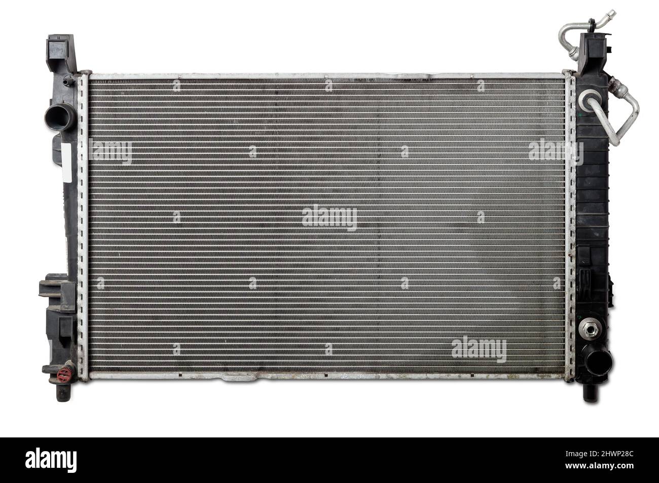 The cooling radiator is a metal heat exchanger inside filled with antifreeze. Repair in the workshop. Parts Catalog. Stock Photo