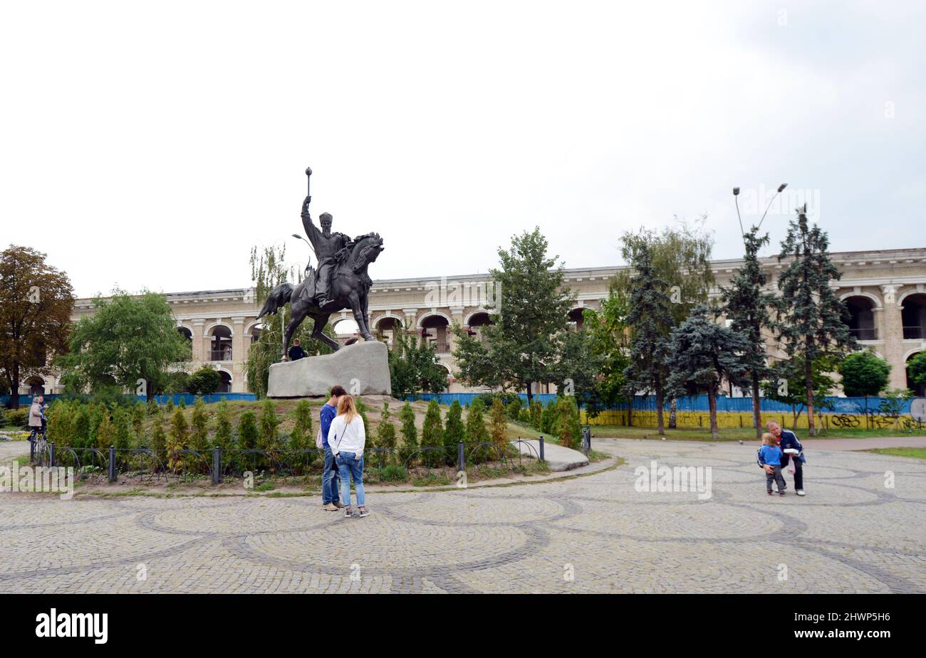 Ukrainian children playing by the Monument Petra Sagaidachnogo in Kyiv, Ukraine. Stock Photo