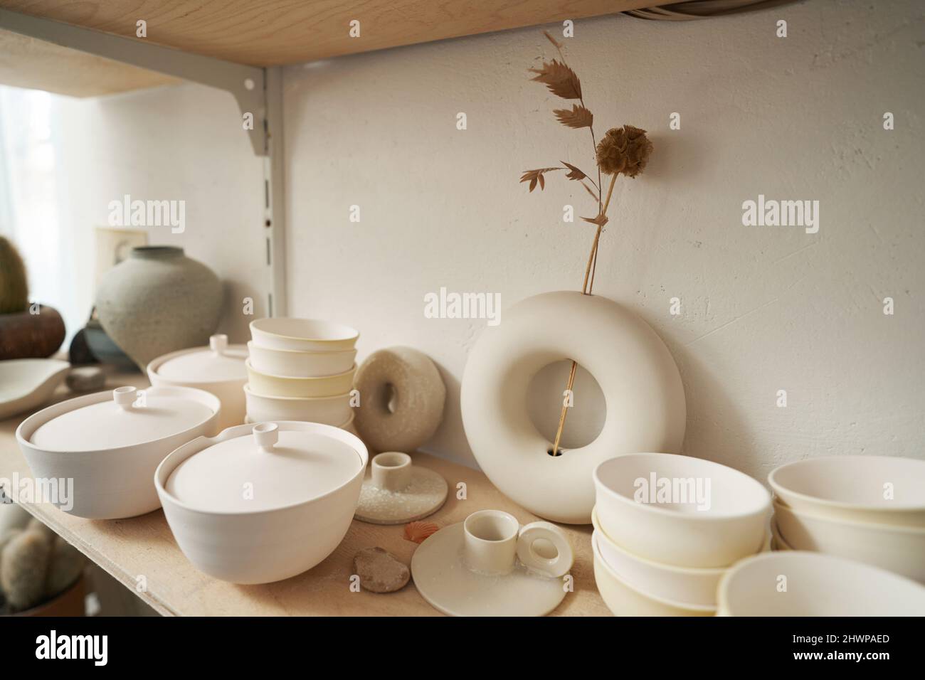 Modern ceramic wares stored in pottery studio Stock Photo Alamy