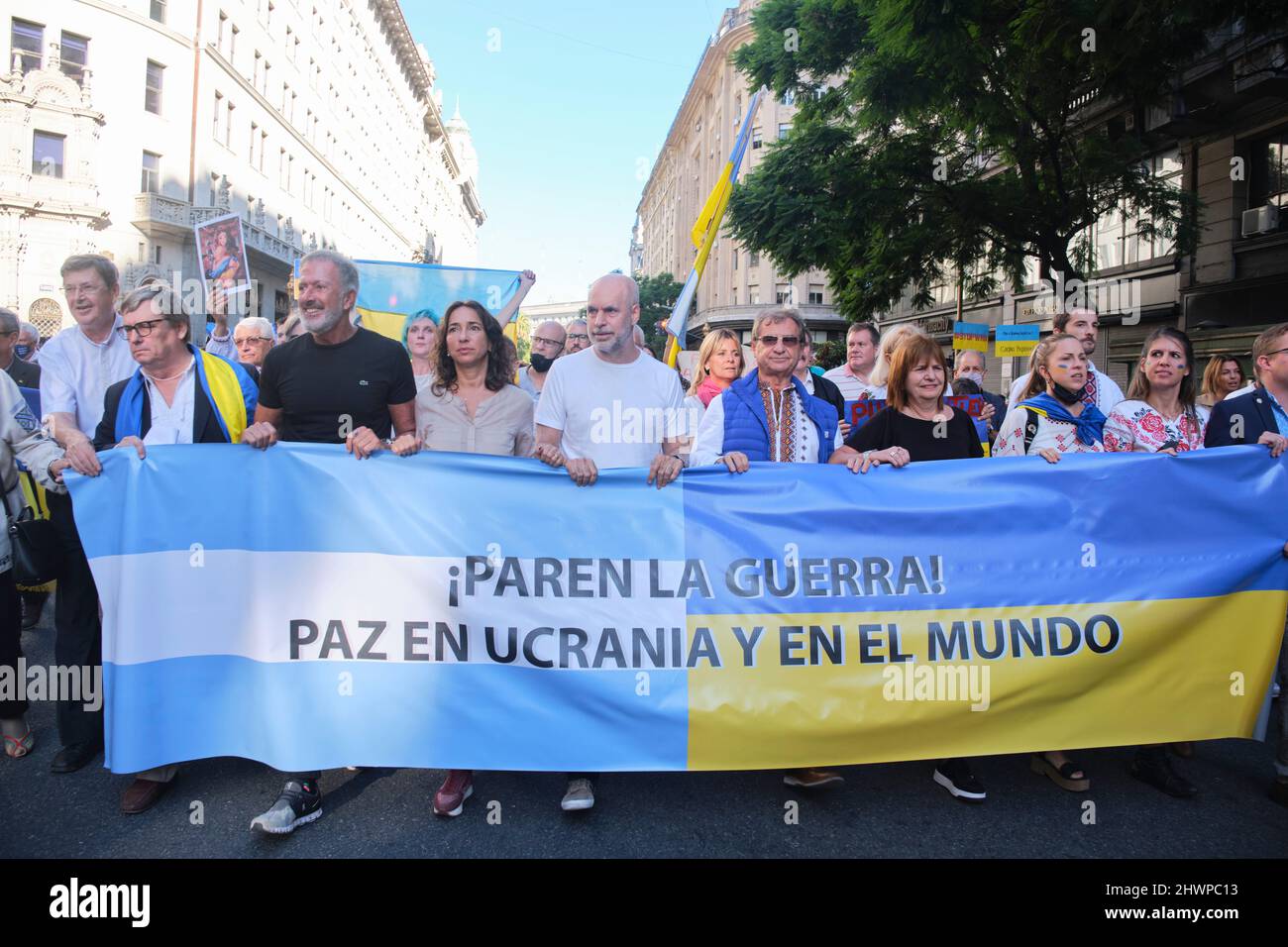 Buenos Aires, Argentina; March 6, 2022: People from the Ukrainian community and political leaders march for peace in Ukraine. Text: Stop the war, peac Stock Photo