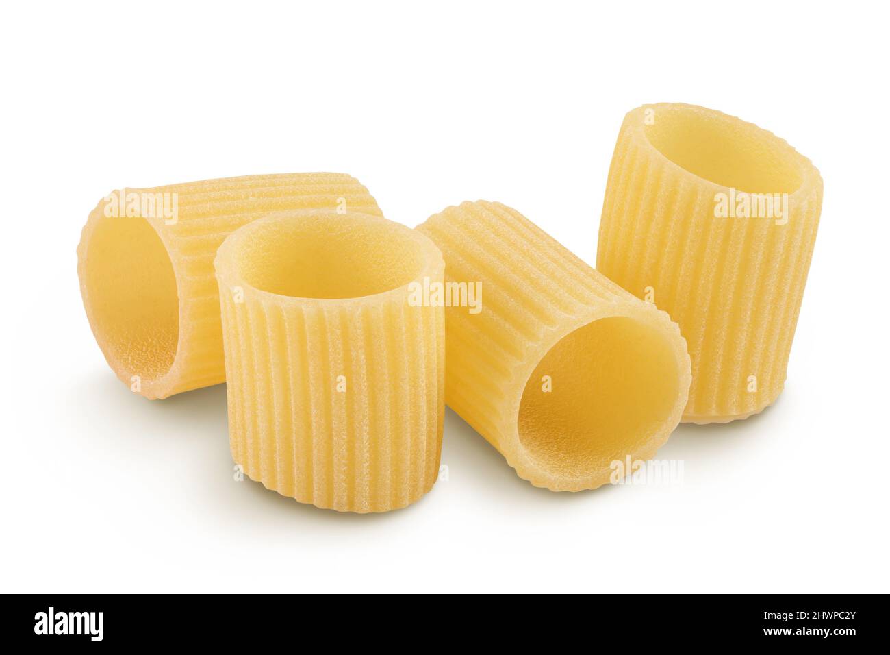 raw italian pasta isolated on white background with clipping path . Mezze Maniche Rigate Bronze die Stock Photo