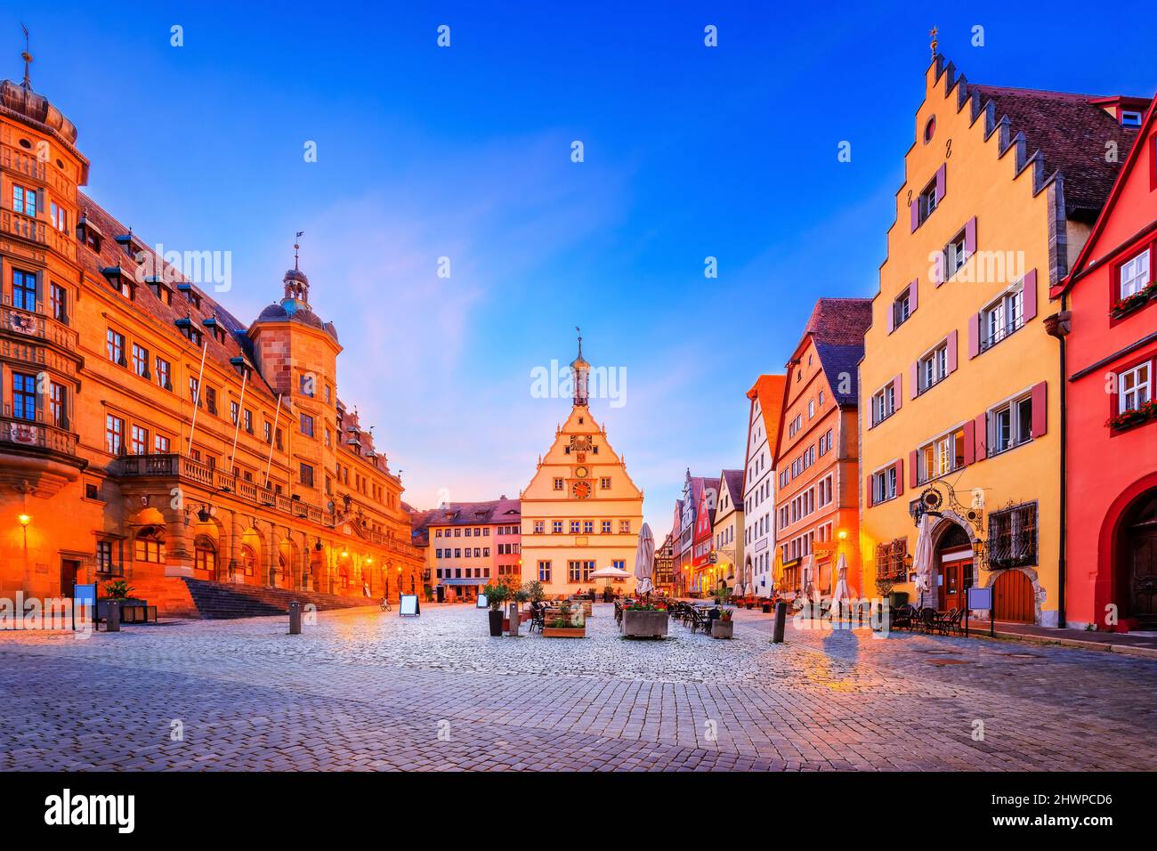 Rothenburg ob der Tauber, Bavaria, Germany. Medieval town of Rothenburg at night. Market Square and Town Hall. Stock Photo