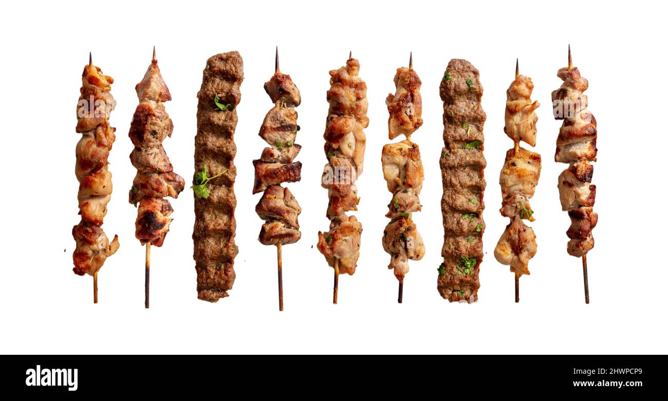 Grilled meat skewers variety isolated on white, Souvlaki chicken and