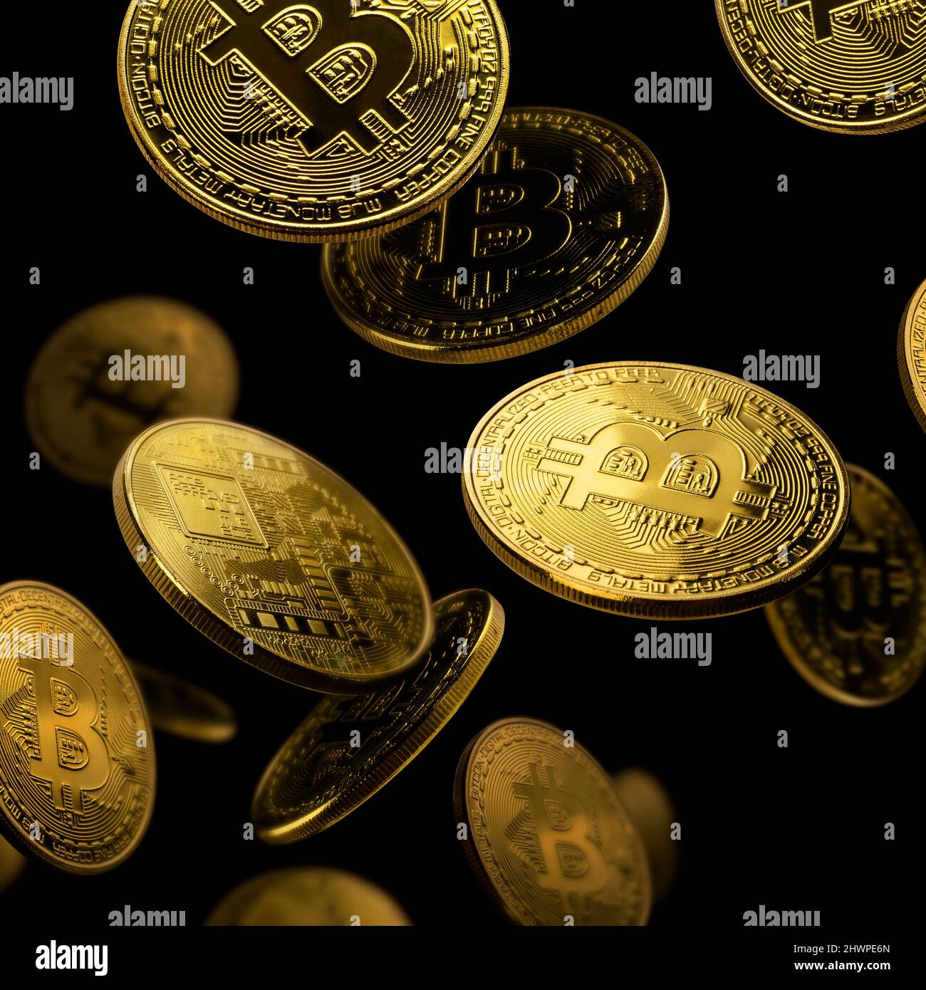 Gold coin Bitcoin levitates on a black background Stock Photo - Alamy