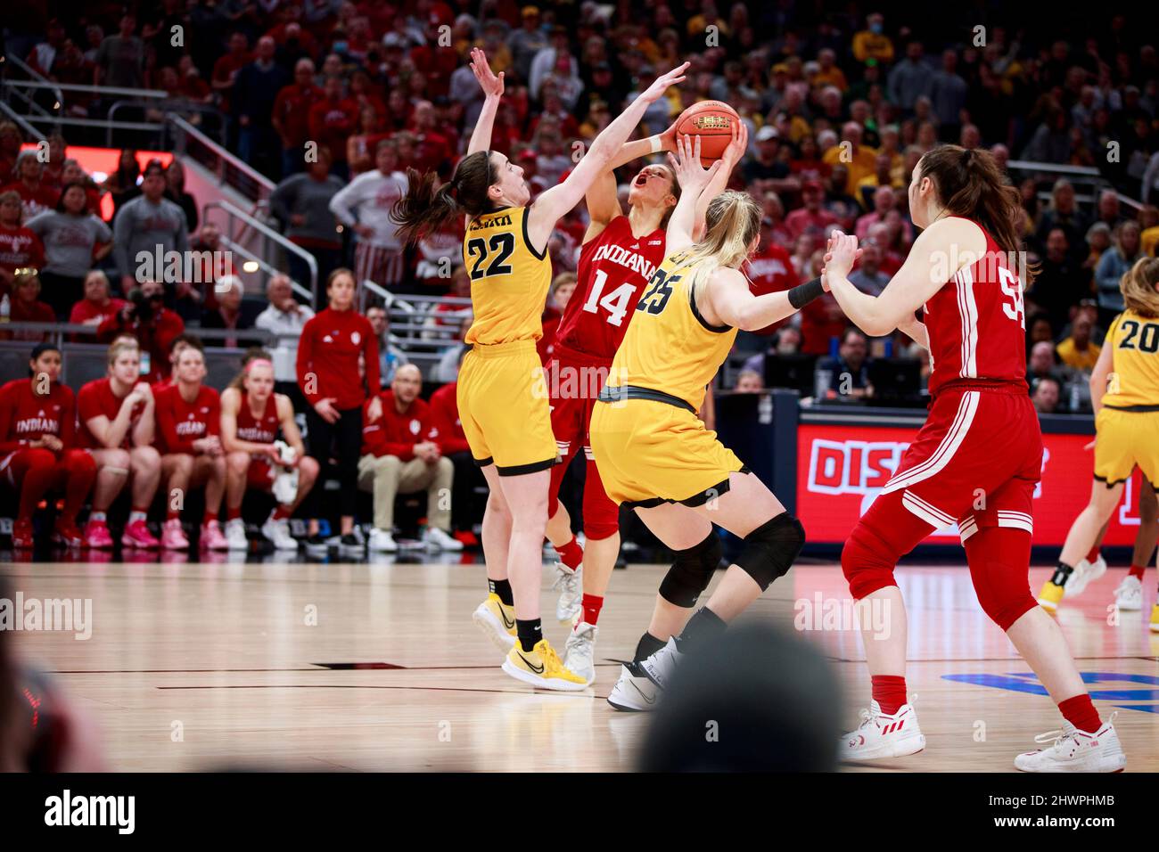 Indianapolis, United States. 06th Mar, 2022. Indiana Hoosiers guard Ali Patberg (14) plays against Iowa Hawkeyes guard Caitlin Clark (22) during the NCAA basketball Women's Big Ten Tournament game in Indianapolis. Iowa beat Indiana University 74-67. (Photo by Jeremy Hogan/SOPA Images/Sipa USA) Credit: Sipa USA/Alamy Live News Stock Photo