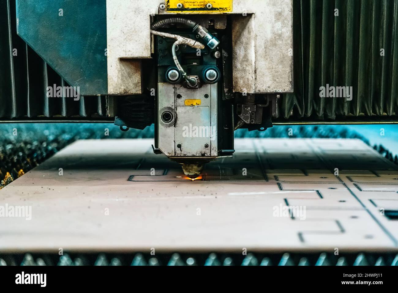 CNC cutting metal. Laser plasma cutter machine close up. Stock Photo