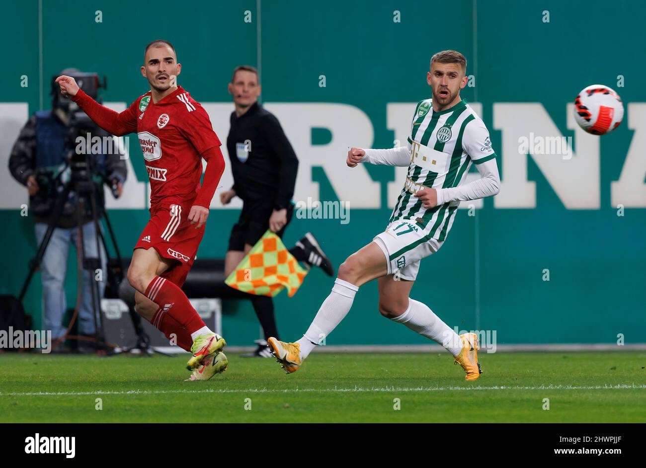 BUDAPEST, HUNGARY - MARCH 6: Claudiu Bumba of Kisvarda Master Good  challenges Henry Wingo of Ferencvarosi TC during the Hungarian OTP Bank  Liga match between Ferencvarosi TC and Kisvarda Master Good at